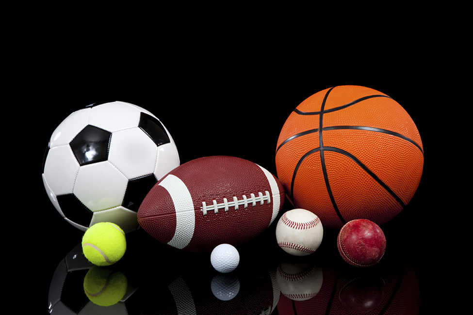 Assorted sports balls on a black background – Carol City Elementary
